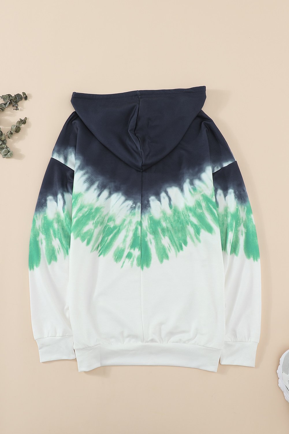 Demi Tie-dye Hoodie featuring a stylish tie-dye print, oversized fit, and kangaroo pocket, perfect for casual wear.