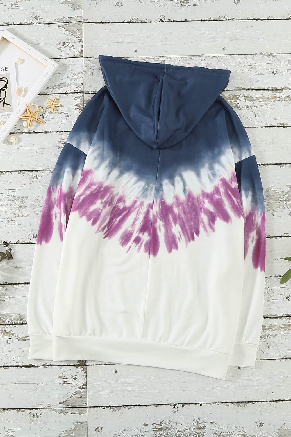 Demi Tie-dye Hoodie featuring a stylish tie-dye print, oversized fit, and kangaroo pocket, perfect for casual wear.