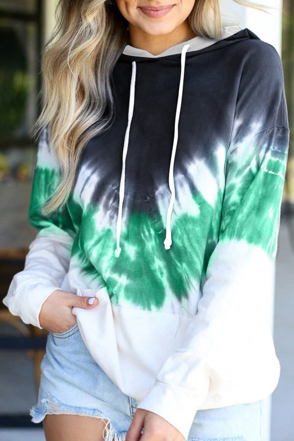 Demi Tie-dye Hoodie featuring a stylish tie-dye print, oversized fit, and kangaroo pocket, perfect for casual wear.