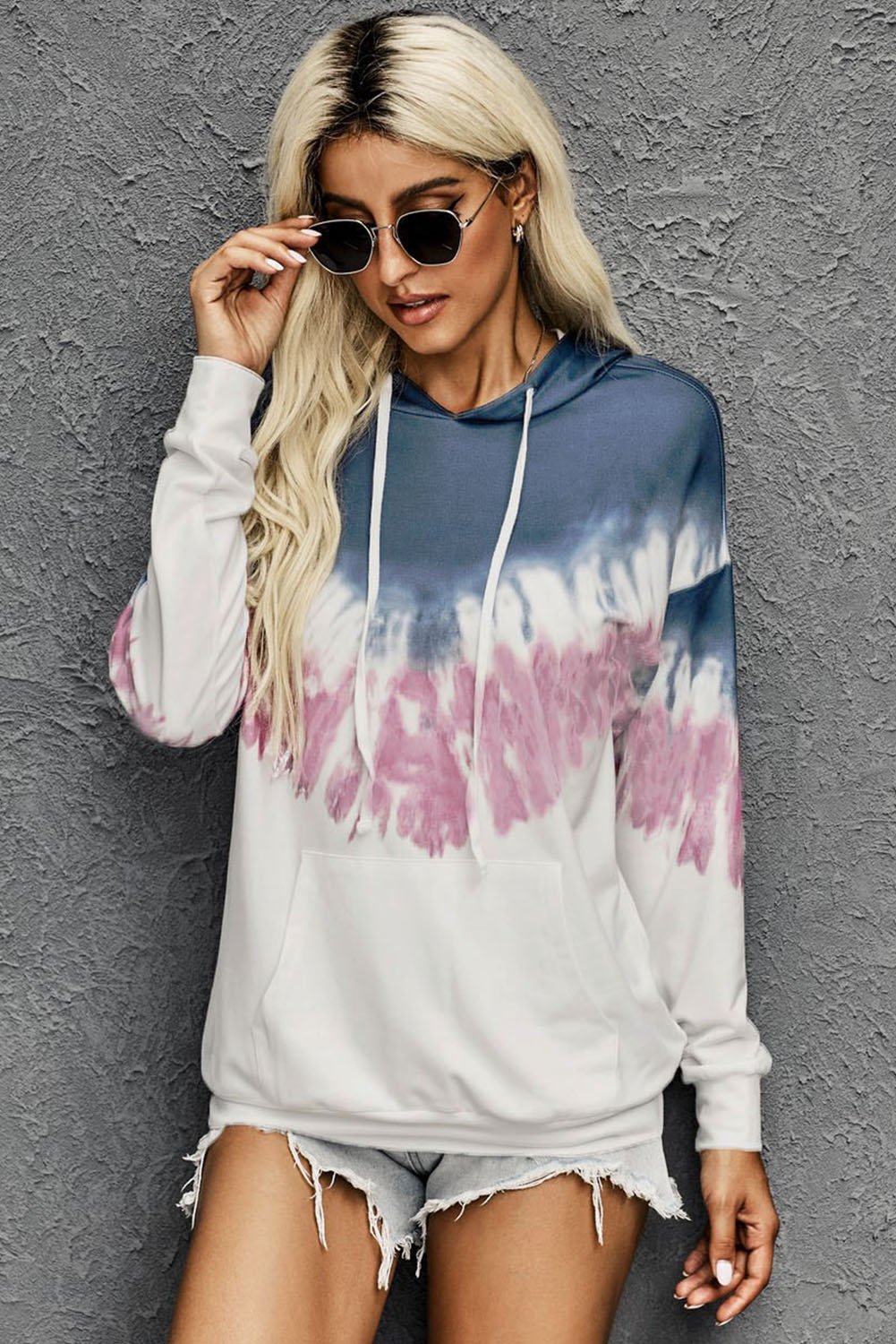 Demi Tie-dye Hoodie featuring a stylish tie-dye print, oversized fit, and kangaroo pocket, perfect for casual wear.