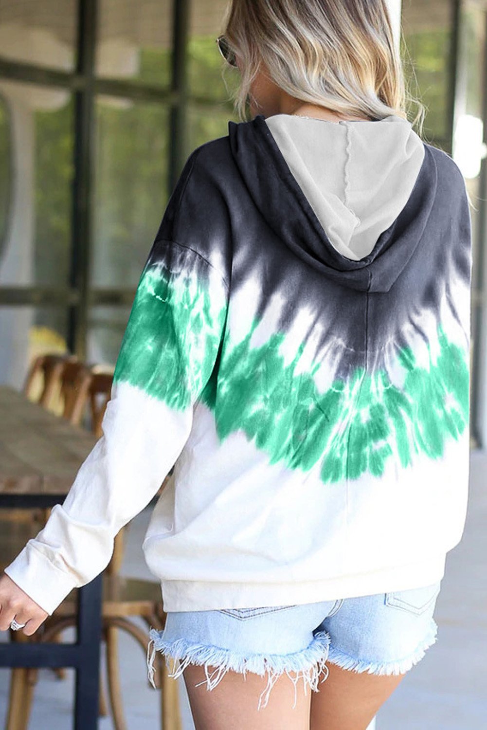 Demi Tie-dye Hoodie featuring a stylish tie-dye print, oversized fit, and kangaroo pocket, perfect for casual wear.