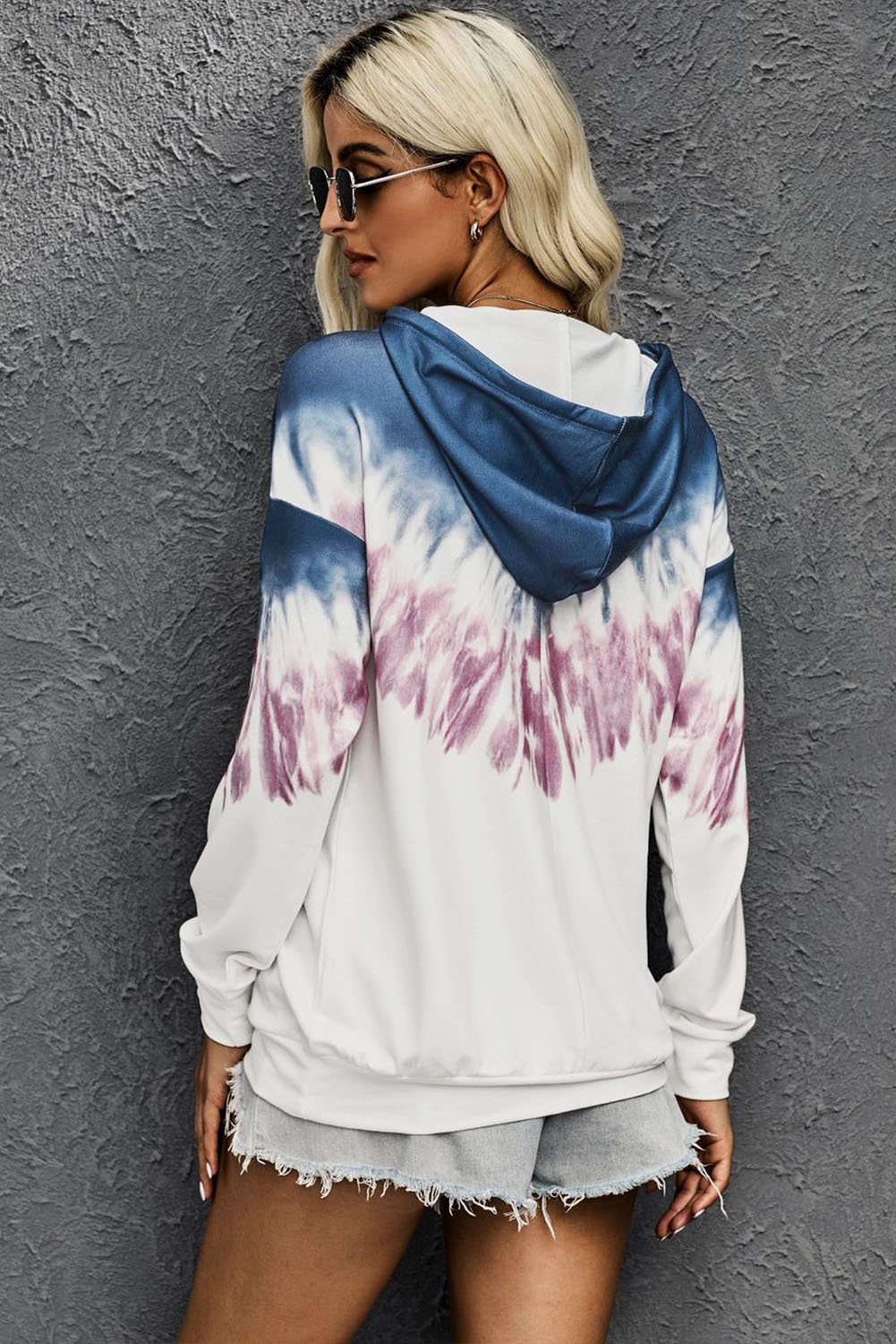 Demi Tie-dye Hoodie featuring a stylish tie-dye print, oversized fit, and kangaroo pocket, perfect for casual wear.