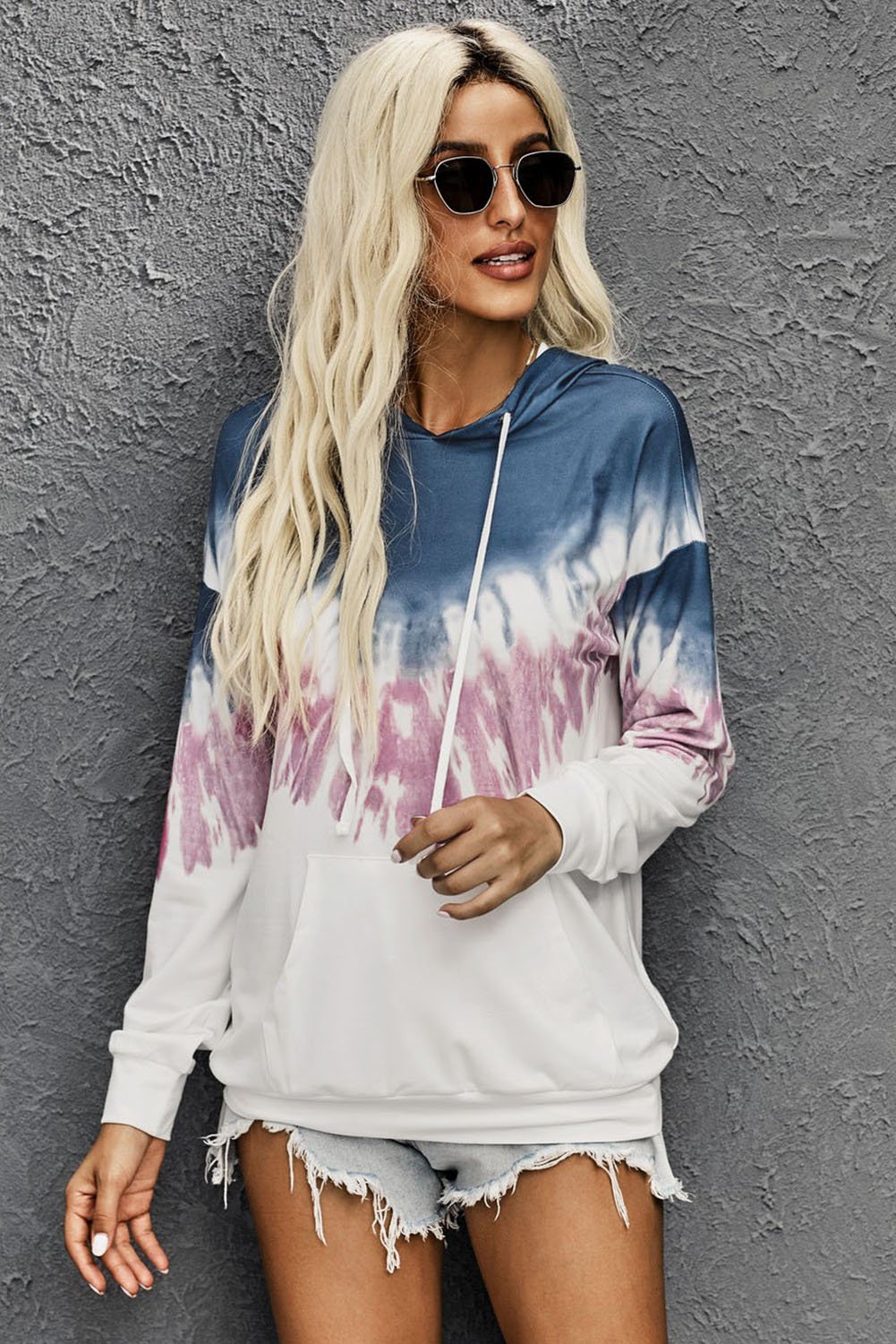 Demi Tie-dye Hoodie featuring a stylish tie-dye print, oversized fit, and kangaroo pocket, perfect for casual wear.