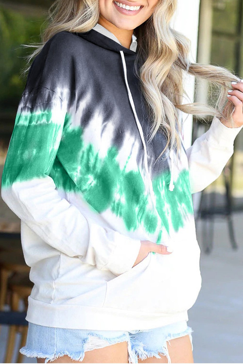 Demi Tie-dye Hoodie featuring a stylish tie-dye print, oversized fit, and kangaroo pocket, perfect for casual wear.