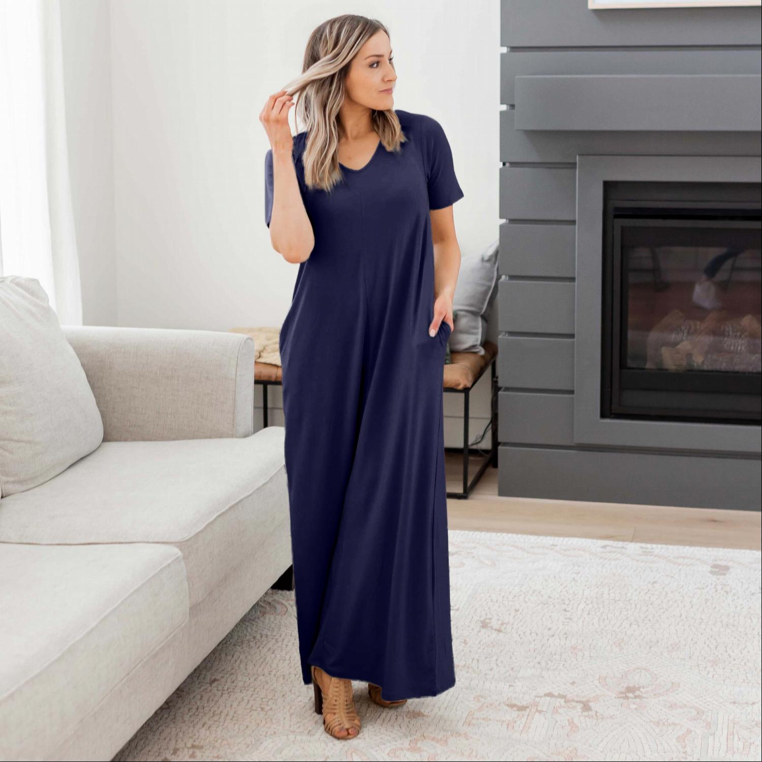 Demure V-Neck Maxi Dress featuring a flattering design with pockets, made from soft stretchy fabric, perfect for all seasons.