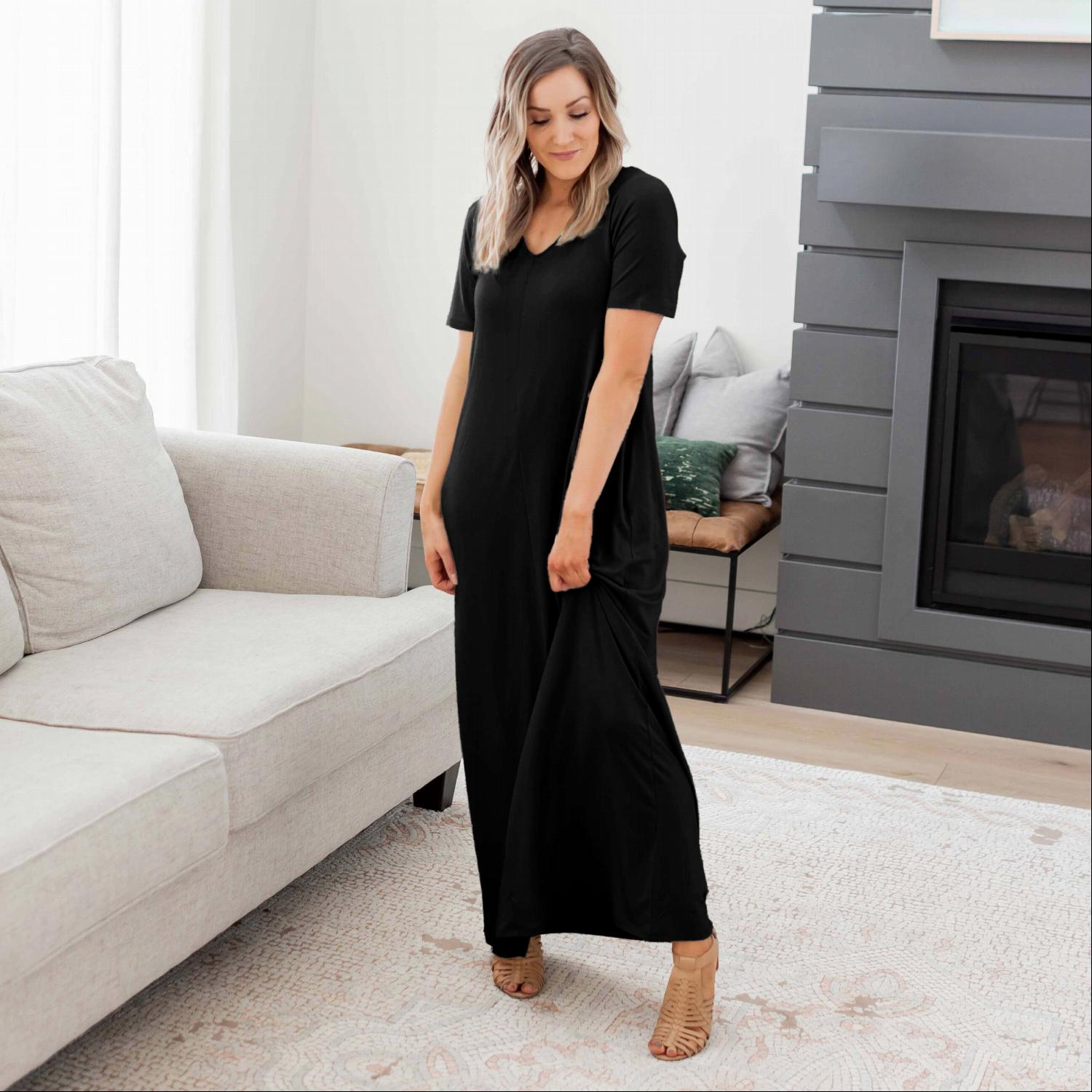 Demure V-Neck Maxi Dress featuring a flattering design with pockets, made from soft stretchy fabric, perfect for all seasons.