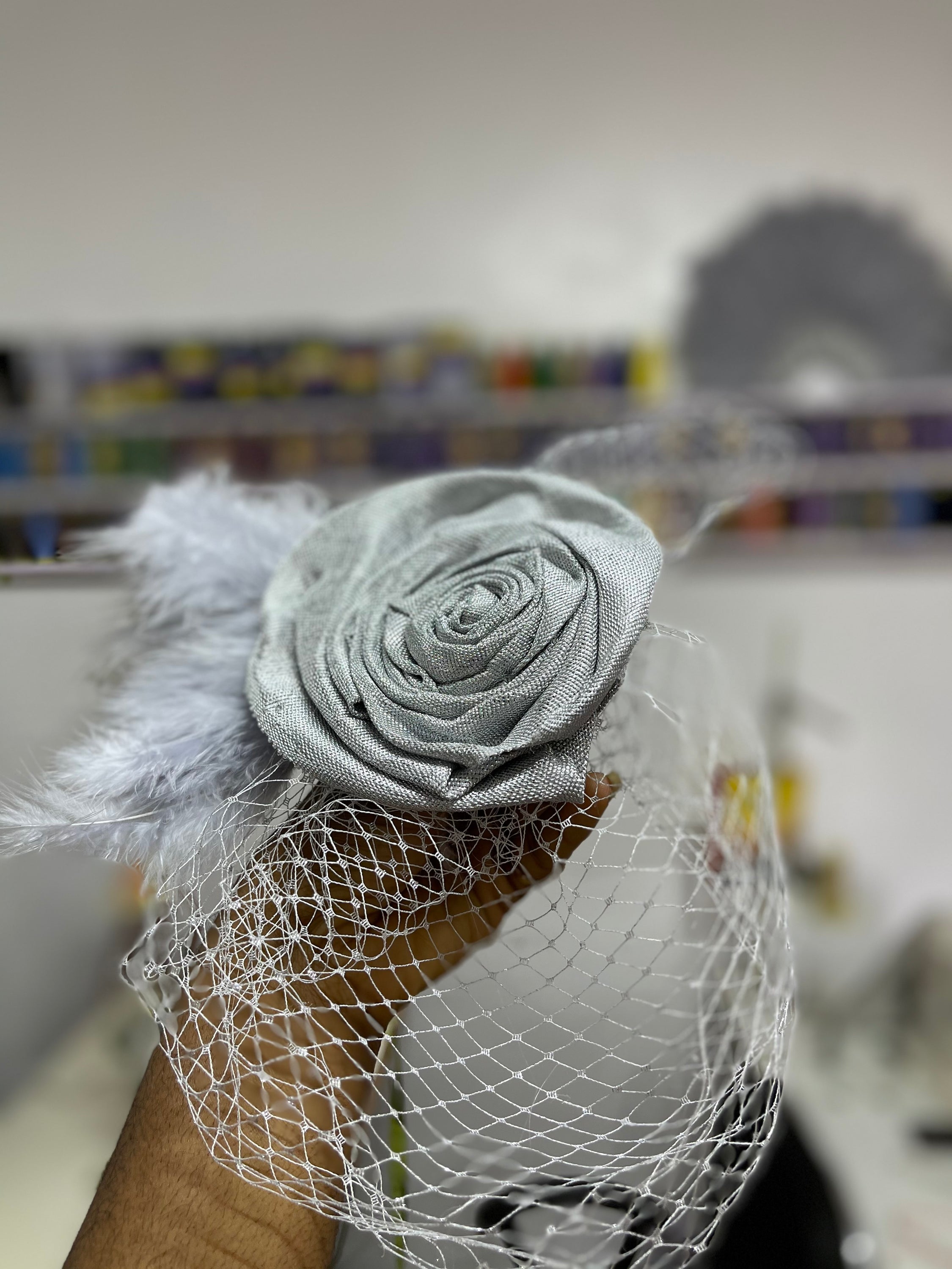 Dera Fascinator made from asooke gele with birdcage net, showcasing a unique and elegant design for African events.