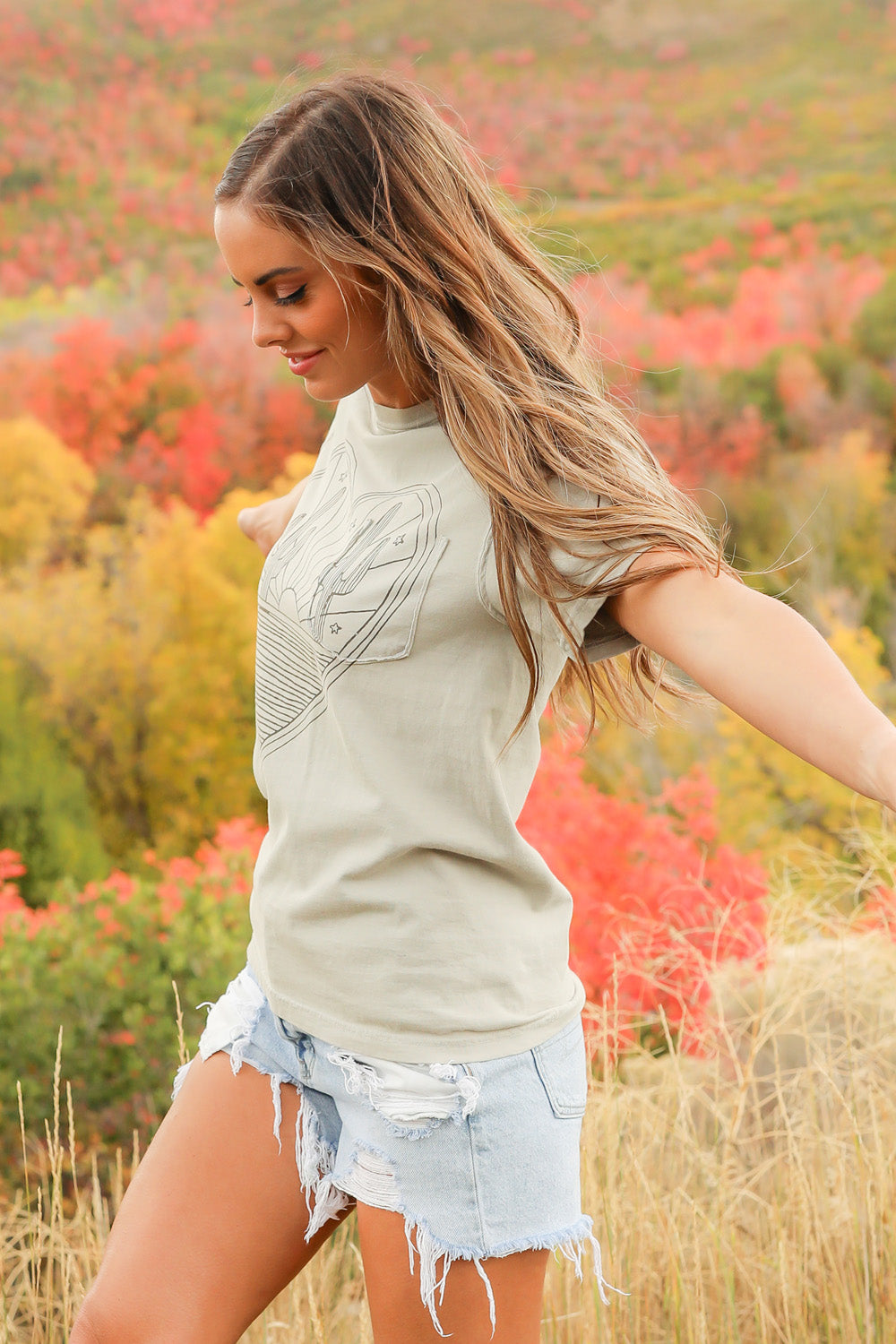 Desert Heart shirt in mint color, made from 100% upcycled cotton, showcasing its stylish design and ethical production.