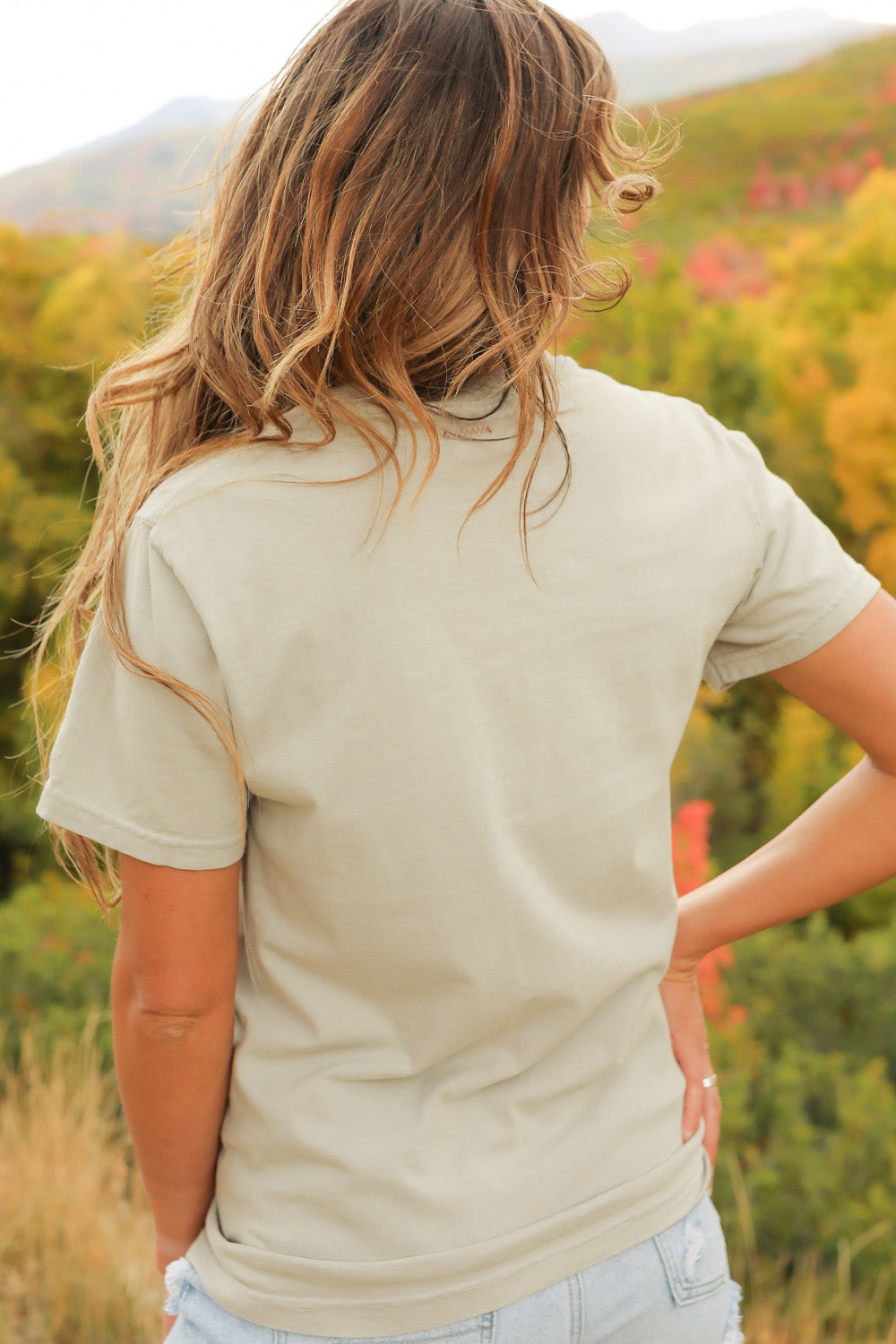 Desert Heart shirt in mint color, made from 100% upcycled cotton, showcasing its stylish design and ethical production.