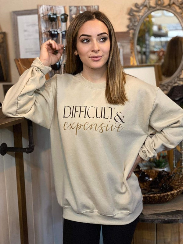 A stylish unisex sweatshirt featuring the phrase 'Difficult and Expensive' in a bold screen print, made from a soft cotton-polyester blend.