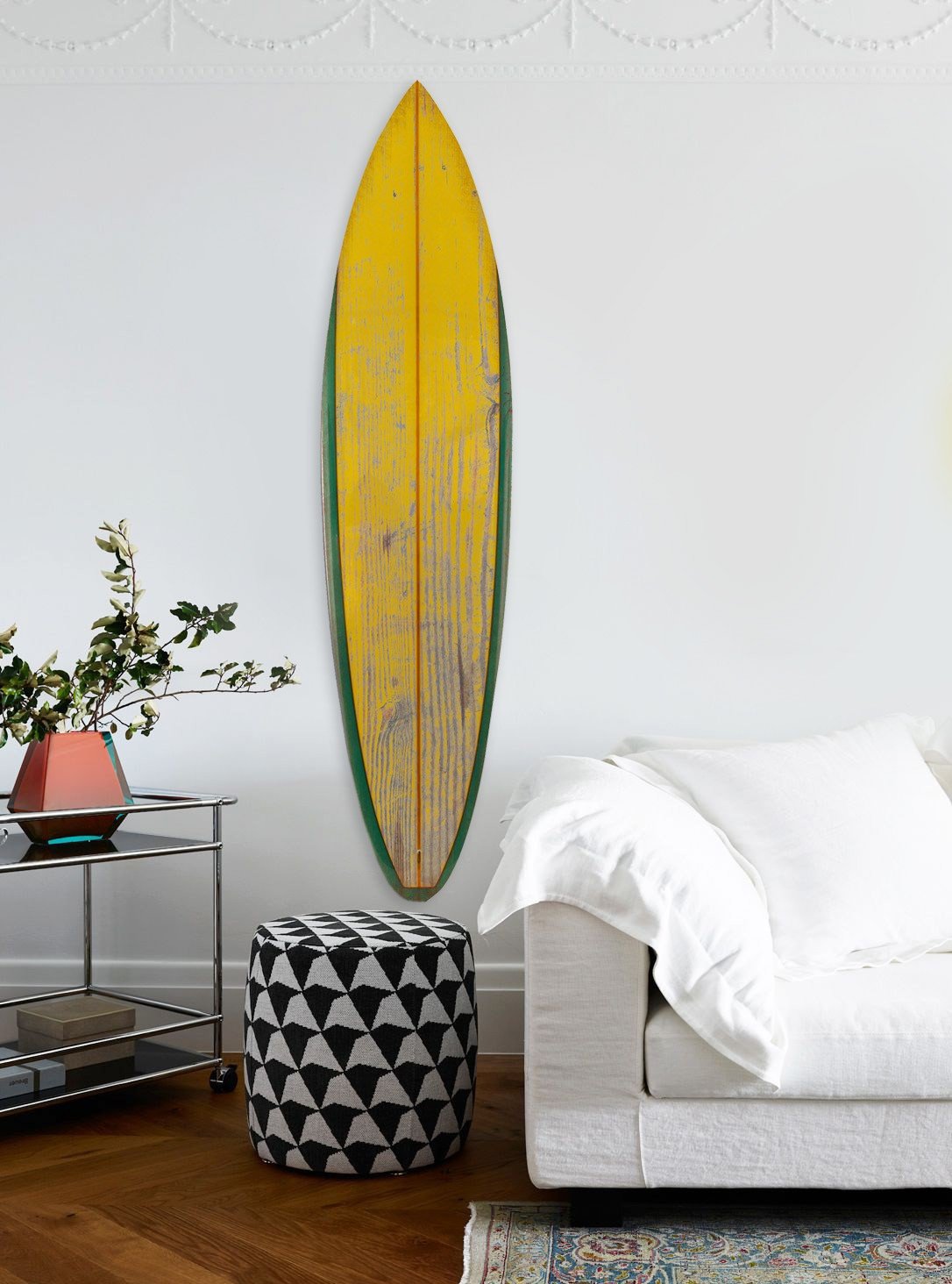 Distressed yellow surfboard wood panel wall art with rustic finish, showcasing vibrant colors and unique design, ready to hang.