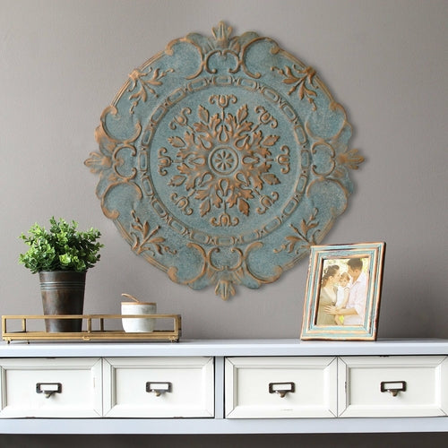 Distressed Blue European Medallion Metal Wall Decor featuring intricate designs and a vintage finish, perfect for enhancing home interiors.