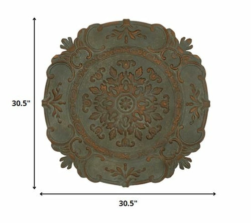 Distressed Blue European Medallion Metal Wall Decor featuring intricate designs and a vintage finish, perfect for enhancing home interiors.