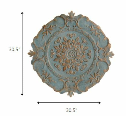 Distressed Blue European Medallion Metal Wall Decor featuring intricate designs and a vintage finish, perfect for enhancing home interiors.