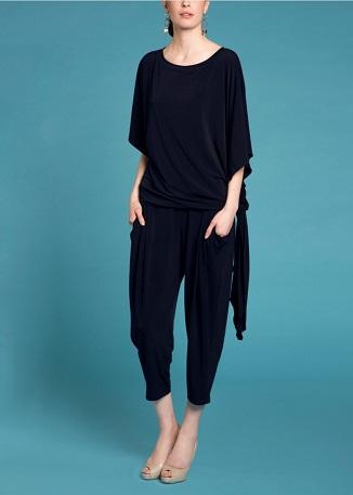 A stylish Dolman Side Tie Tunic in a versatile color, featuring a side tie for adjustable fit and wide sleeves for comfort.