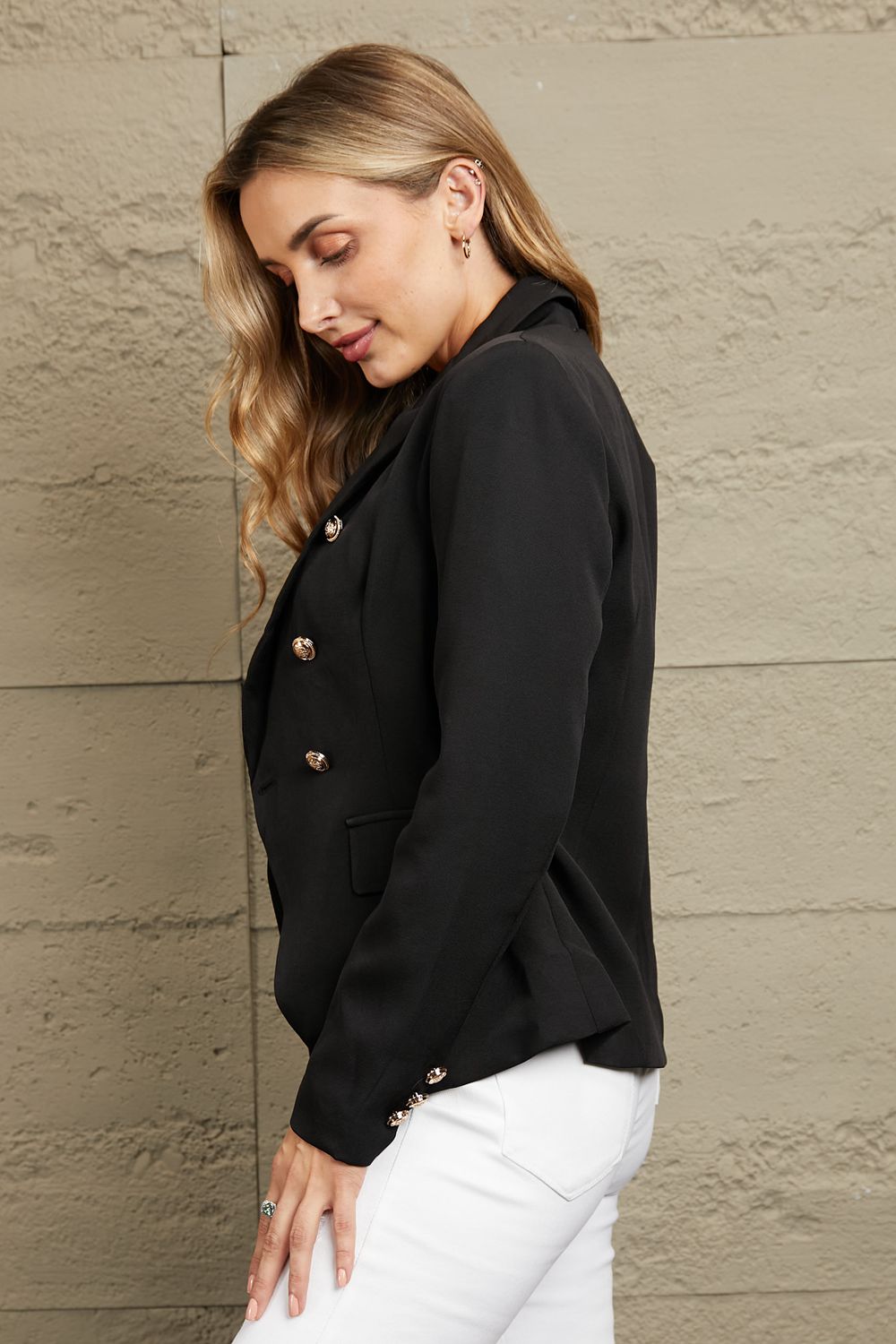 Double Take Double-Breasted Padded Shoulder Blazer in solid color, showcasing its chic design and structured silhouette.