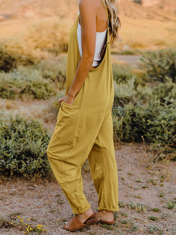 Double Take Full Size Sleeveless V-Neck Pocketed Jumpsuit in a stylish design, showcasing its V-neckline and convenient pockets.