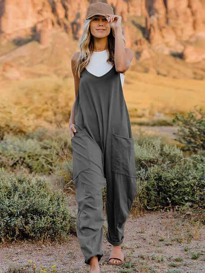 Double Take Full Size Sleeveless V-Neck Pocketed Jumpsuit in a stylish design, showcasing its V-neckline and side pockets.