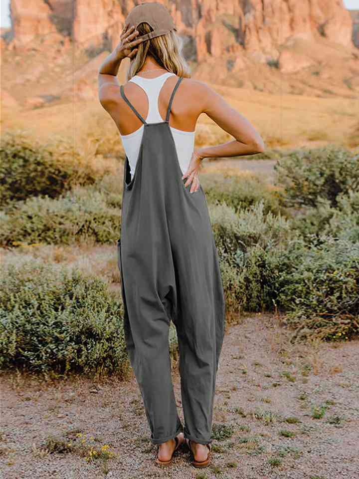 Double Take Full Size Sleeveless V-Neck Pocketed Jumpsuit in a stylish design, showcasing its V-neckline and side pockets.