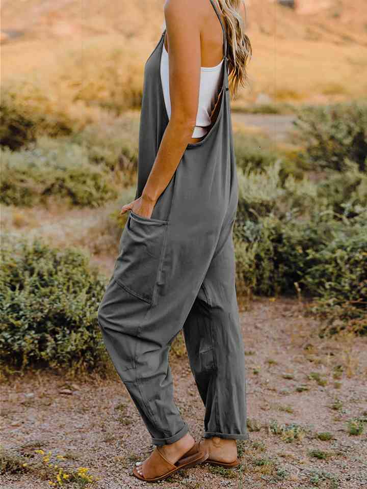 Double Take Full Size Sleeveless V-Neck Pocketed Jumpsuit in a stylish design, showcasing its V-neckline and side pockets.