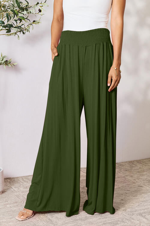 Double Take Full Size Smocked Wide Waistband Wide Leg Pants in a stylish design, showcasing the smocked waistband and wide leg cut.