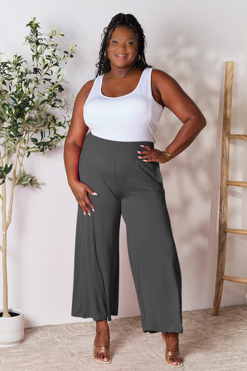 Double Take Full Size Smocked Wide Waistband Wide Leg Pants in a stylish design, showcasing the smocked waistband and wide leg cut.