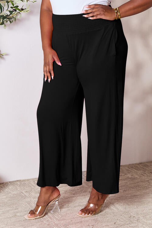 Double Take Full Size Smocked Wide Waistband Wide Leg Pants in a stylish design, showcasing the smocked waistband and wide leg cut.