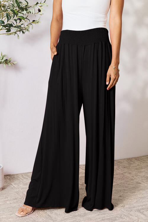 Double Take Full Size Smocked Wide Waistband Wide Leg Pants in a stylish design, showcasing the smocked waistband and wide leg cut.