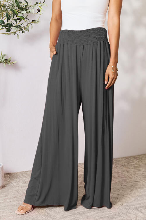 Double Take Full Size Smocked Wide Waistband Wide Leg Pants in a stylish design, showcasing the smocked waistband and wide leg cut.