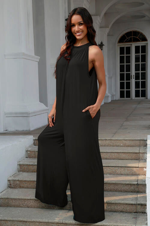 Double Take Full Size Tie Back Cutout Sleeveless Jumpsuit showcasing its stylish design and comfortable fabric.