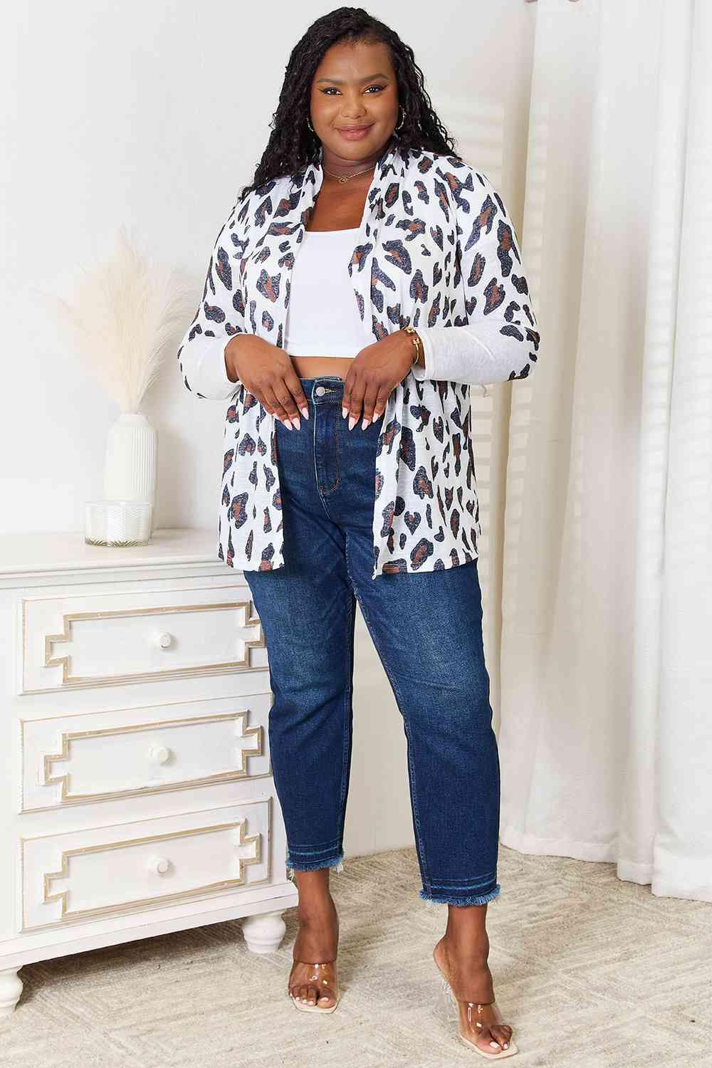 Double Take Leopard Long Sleeve Cardigan featuring bold leopard print and long sleeves, perfect for layering.