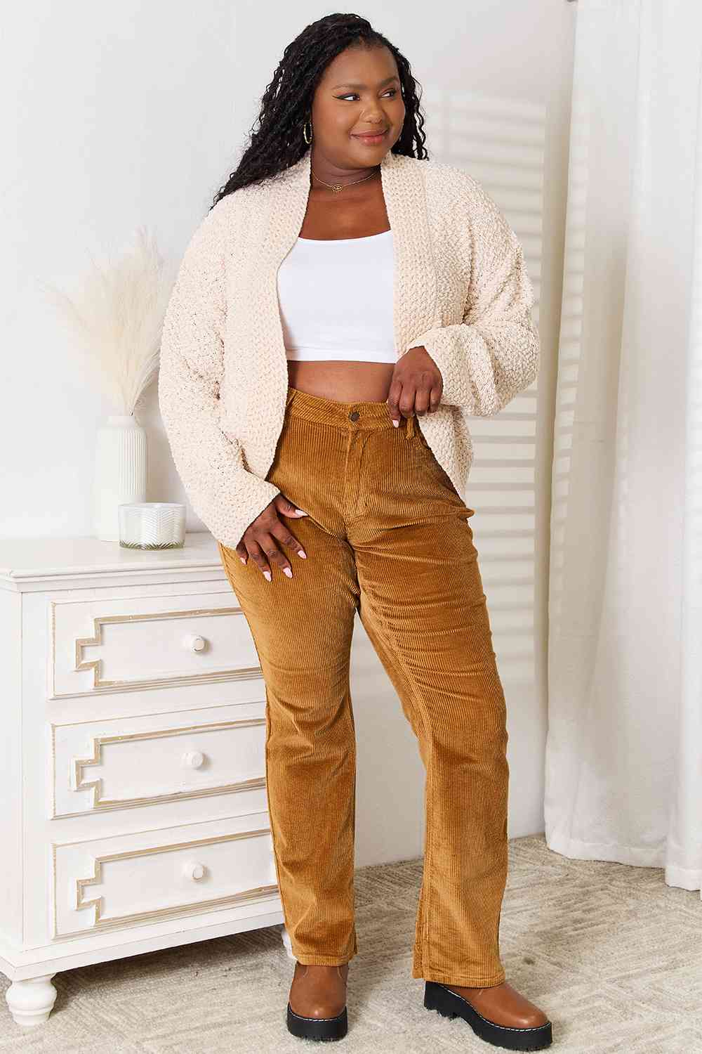 A cozy Double Take Open Front Long Sleeve Cardigan in a neutral color, showcasing its open front design and long sleeves.