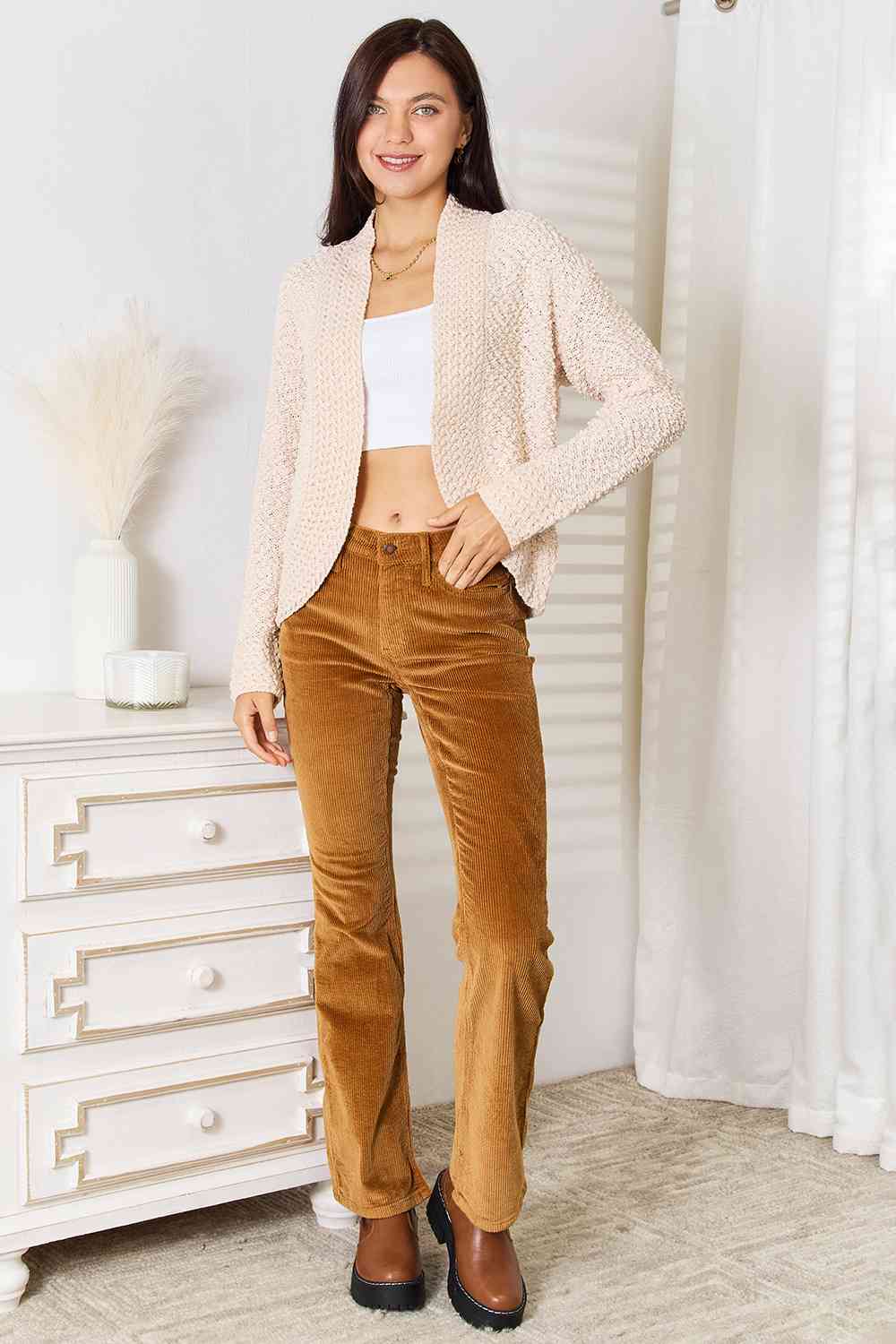 A cozy Double Take Open Front Long Sleeve Cardigan in a neutral color, showcasing its open front design and long sleeves.