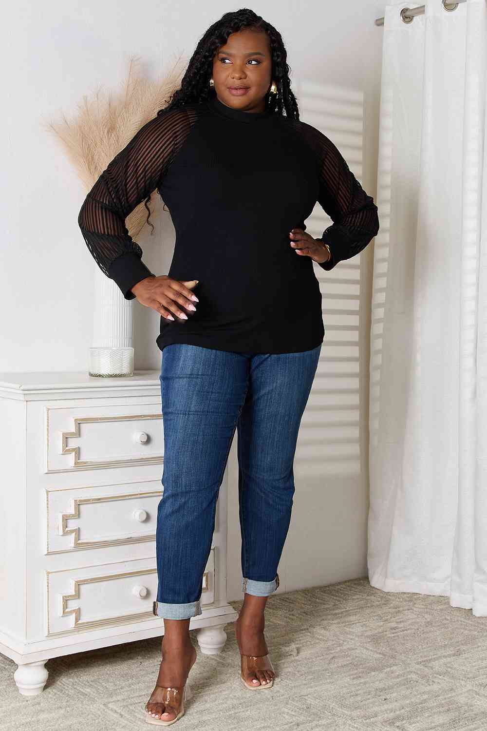 Double Take Round Neck Raglan Sleeve Blouse featuring a classic round neckline and comfortable raglan sleeves in a semi-sheer fabric.