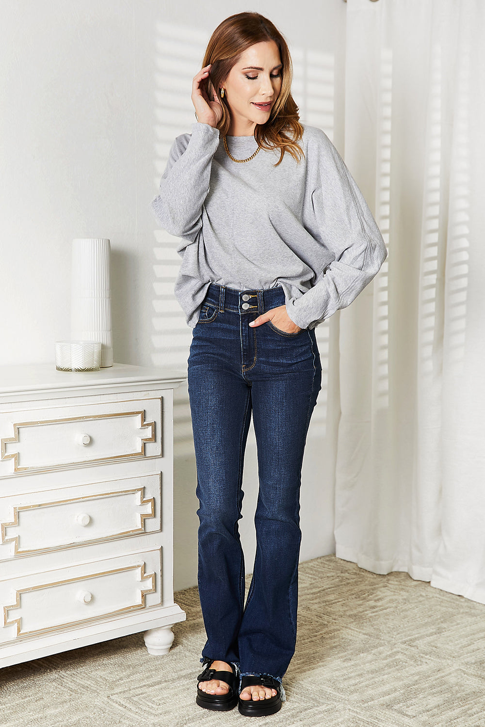 Double Take Seam Detail Round Neck Long Sleeve Top in a stylish design, showcasing seam details and a round neckline.