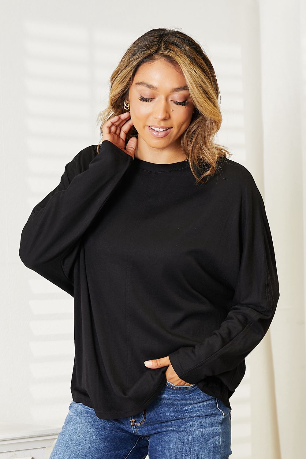 Double Take Seam Detail Round Neck Long Sleeve Top in a stylish design, showcasing seam details and a round neckline.