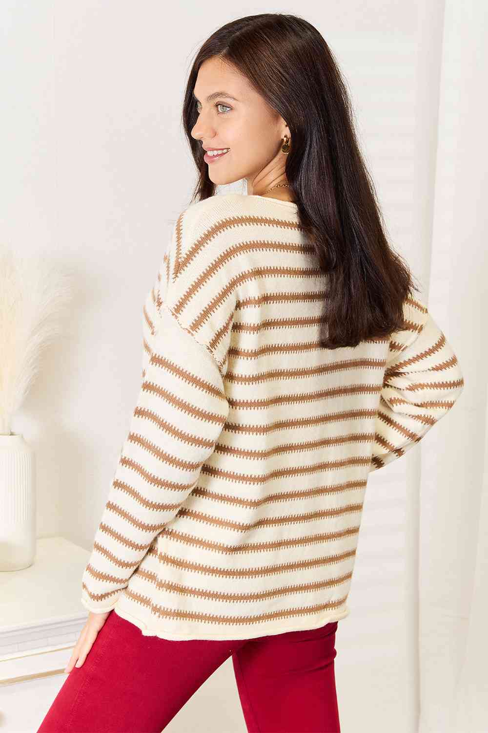 Double Take Striped Boat Neck Sweater featuring a classic boat neck design and stylish striped pattern, perfect for versatile outfits.