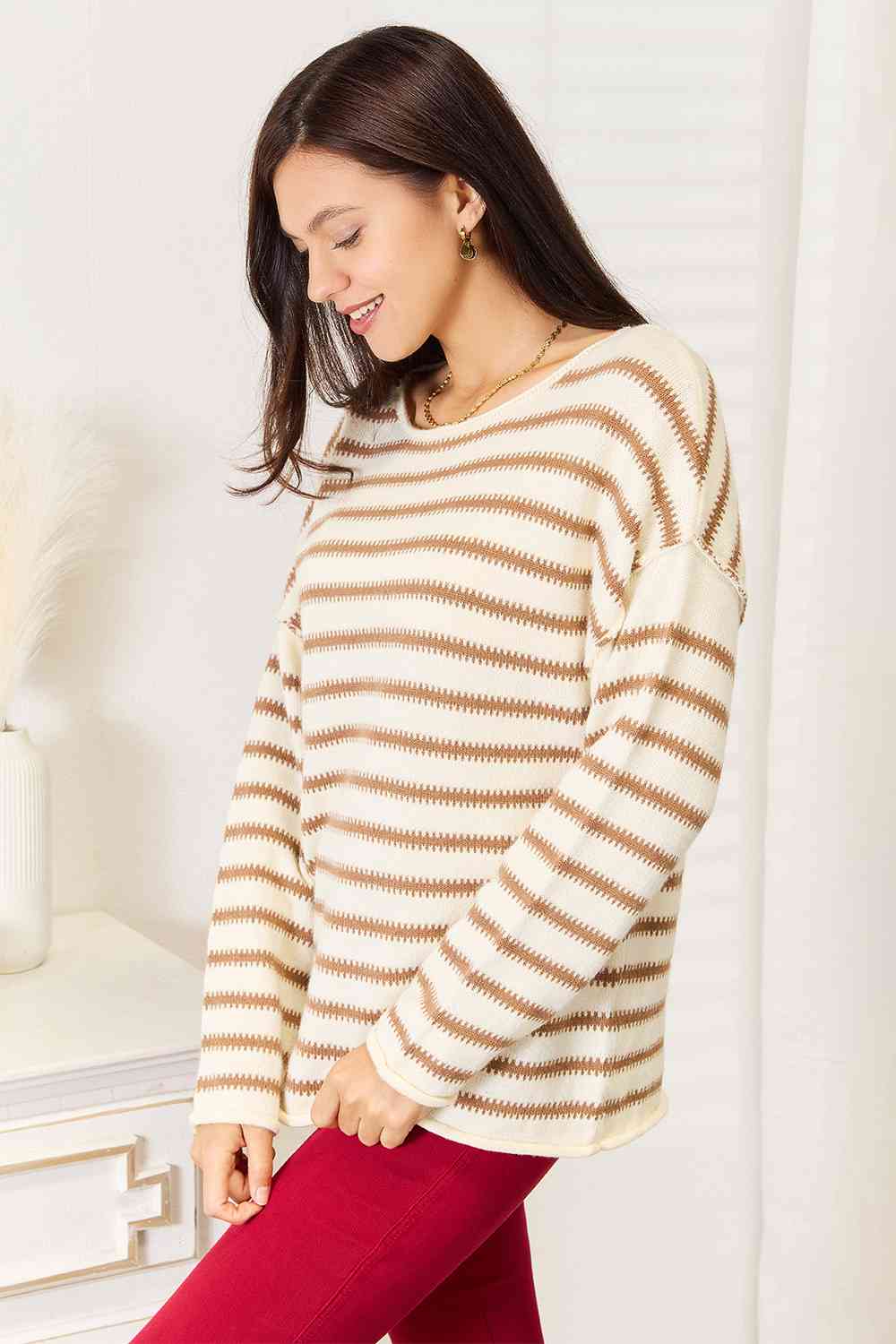 Double Take Striped Boat Neck Sweater featuring a classic boat neck design and stylish striped pattern, perfect for versatile outfits.