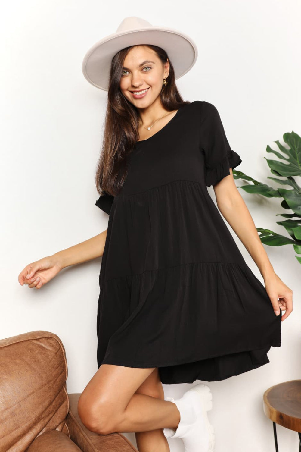 A stylish Double Take V-Neck Flounce Sleeve Tiered Dress featuring a flattering V-neckline and playful flounce sleeves, perfect for various occasions.