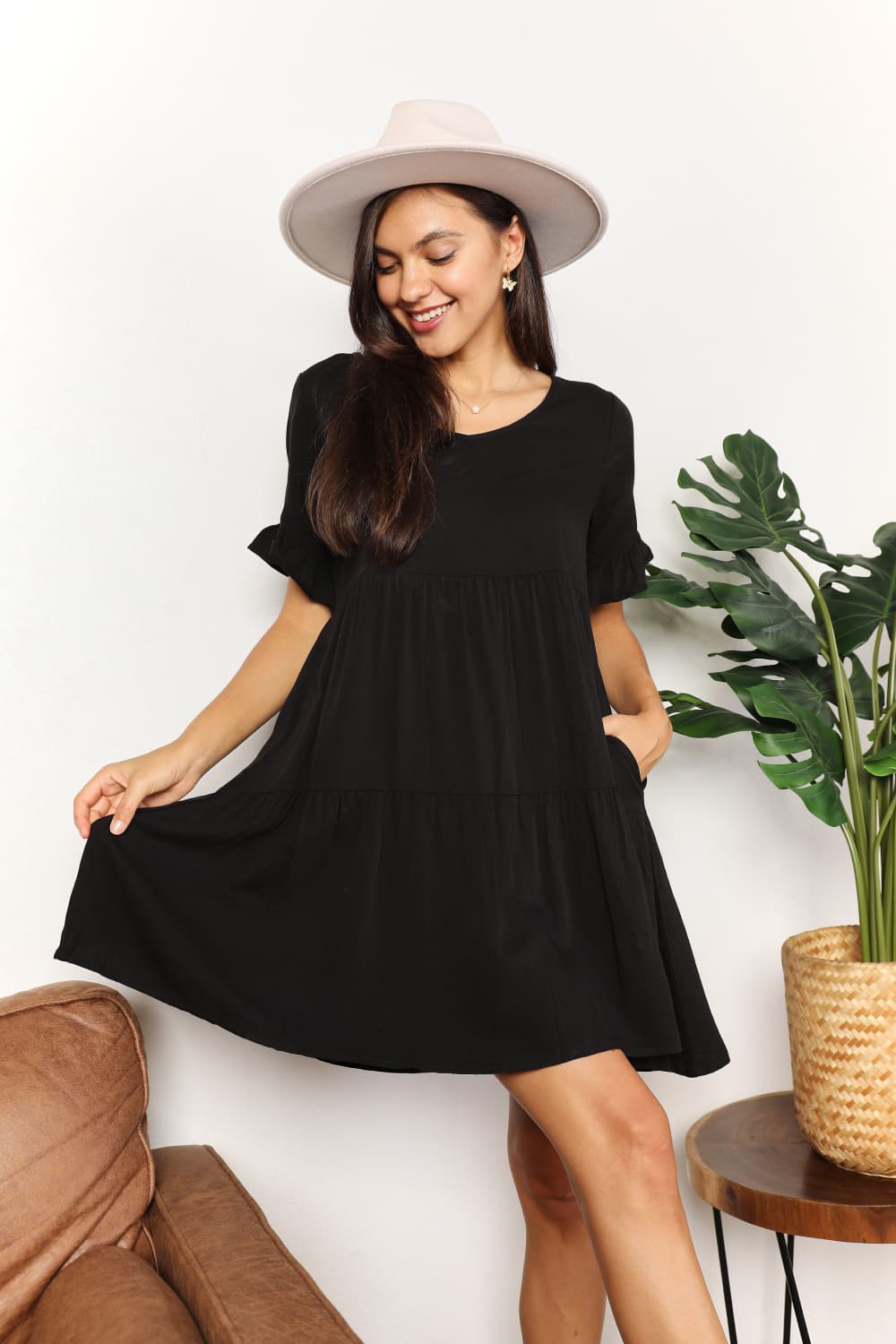 A stylish Double Take V-Neck Flounce Sleeve Tiered Dress featuring a flattering V-neckline and playful flounce sleeves, perfect for various occasions.