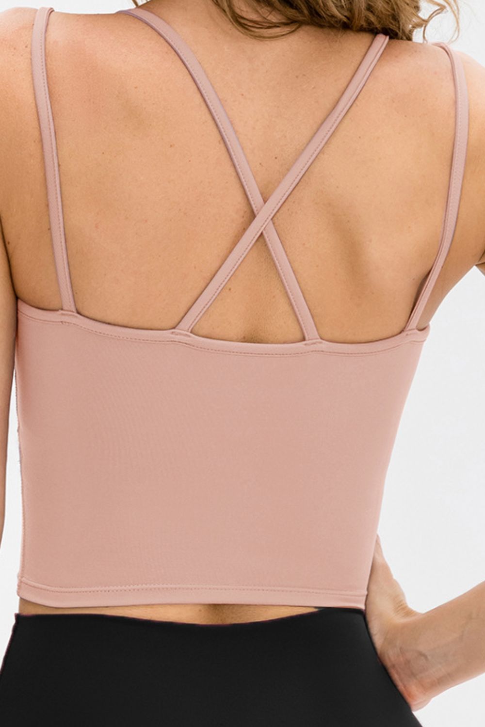 Double-Strap Cropped Yoga Cami in solid color with crisscross back and removable padding, showcasing its stylish design and flexibility.