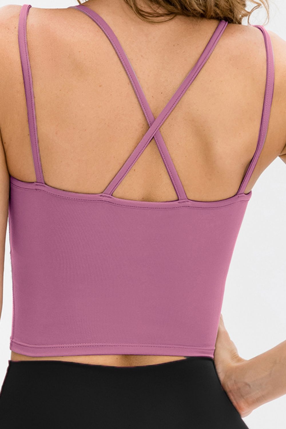 Double-Strap Cropped Yoga Cami in solid color with crisscross back and removable padding, showcasing its stylish design and flexibility.