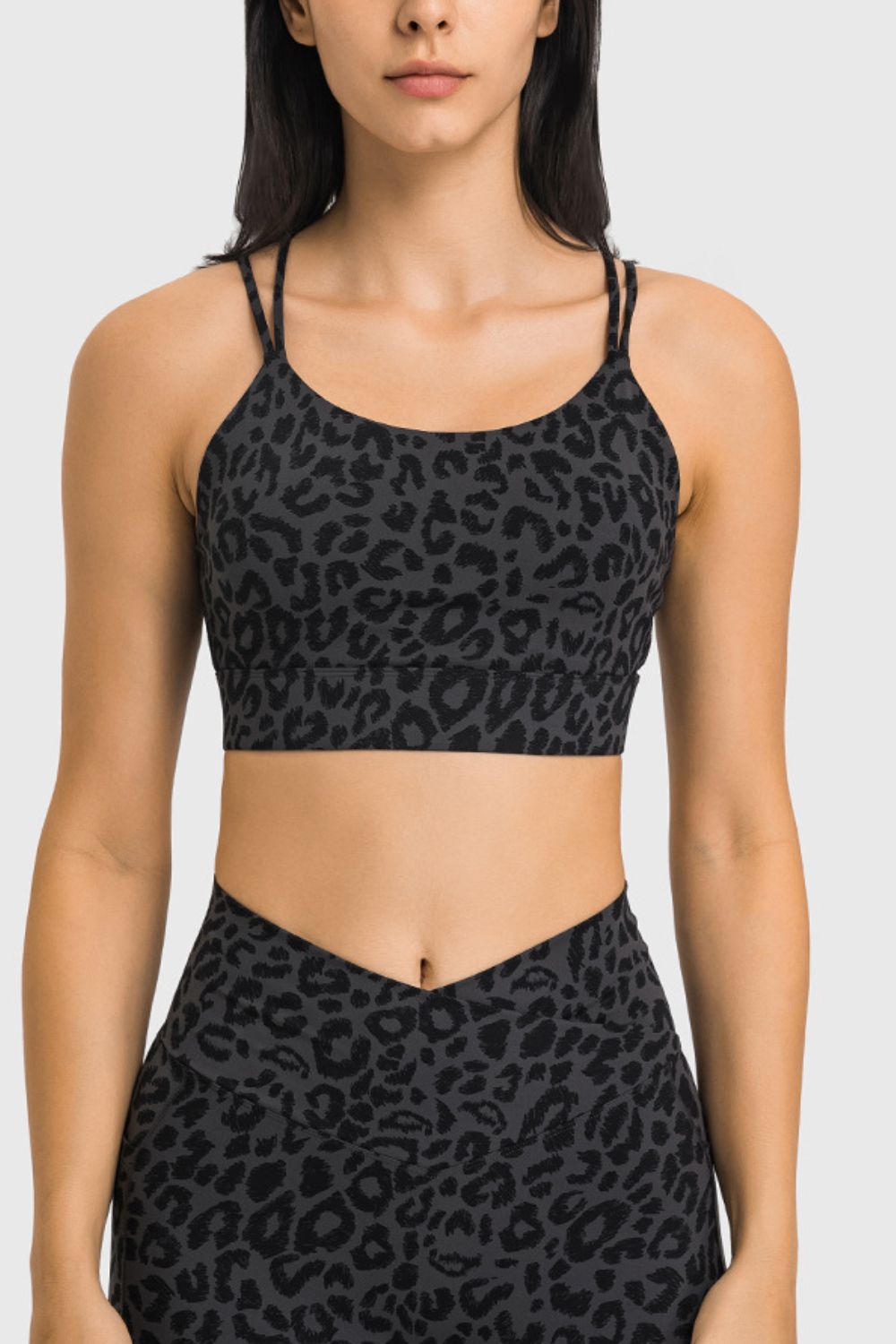 Double-Strap Cutout Sports Bra in solid color, showcasing its scoop neck design and removable padding.