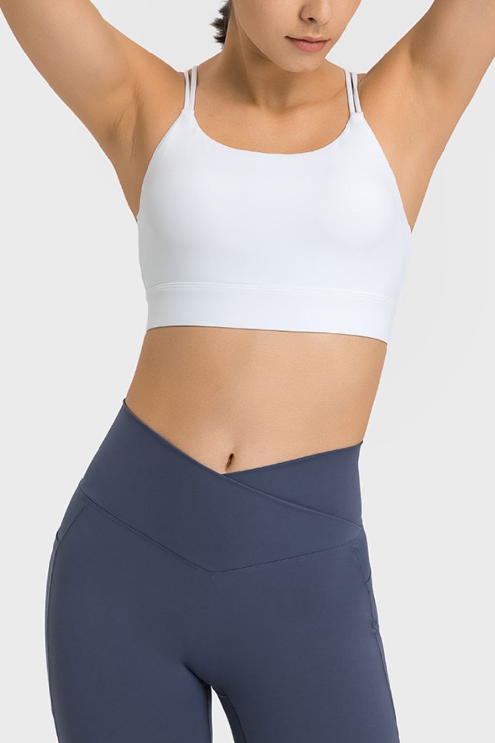 Double-Strap Cutout Sports Bra in solid color, showcasing its scoop neck design and removable padding.