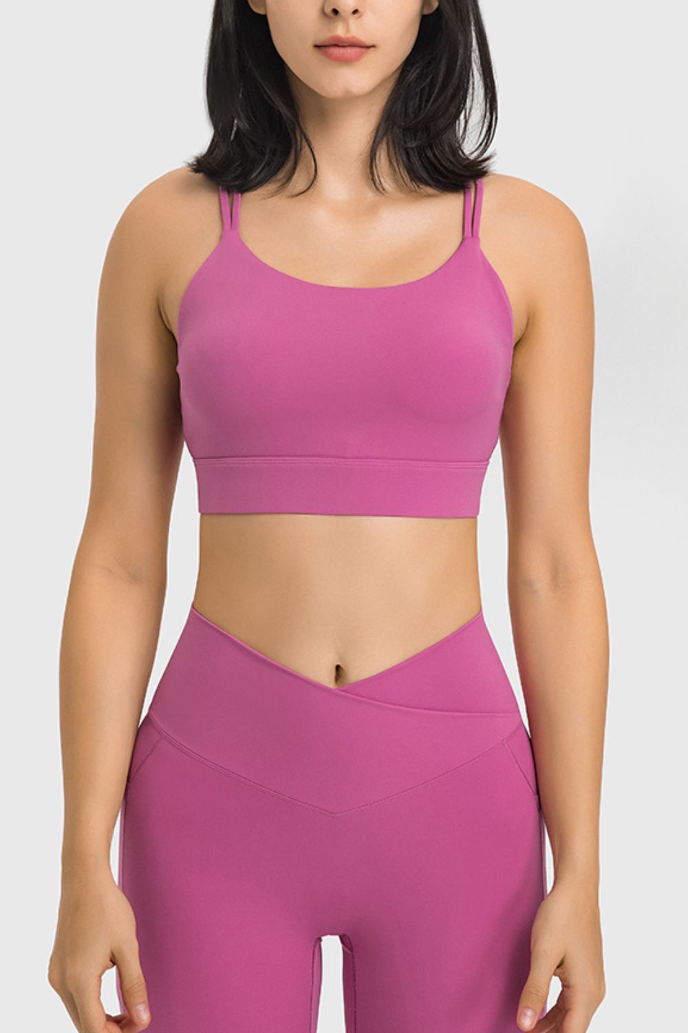 Double-Strap Cutout Sports Bra in solid color, showcasing its scoop neck design and removable padding.