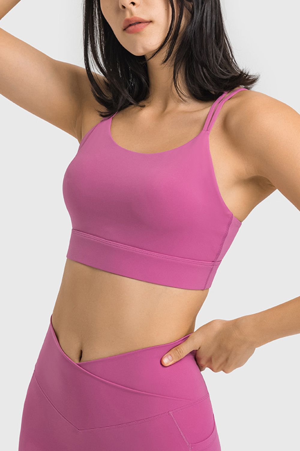 Double-Strap Cutout Sports Bra in solid color, showcasing its scoop neck design and removable padding.