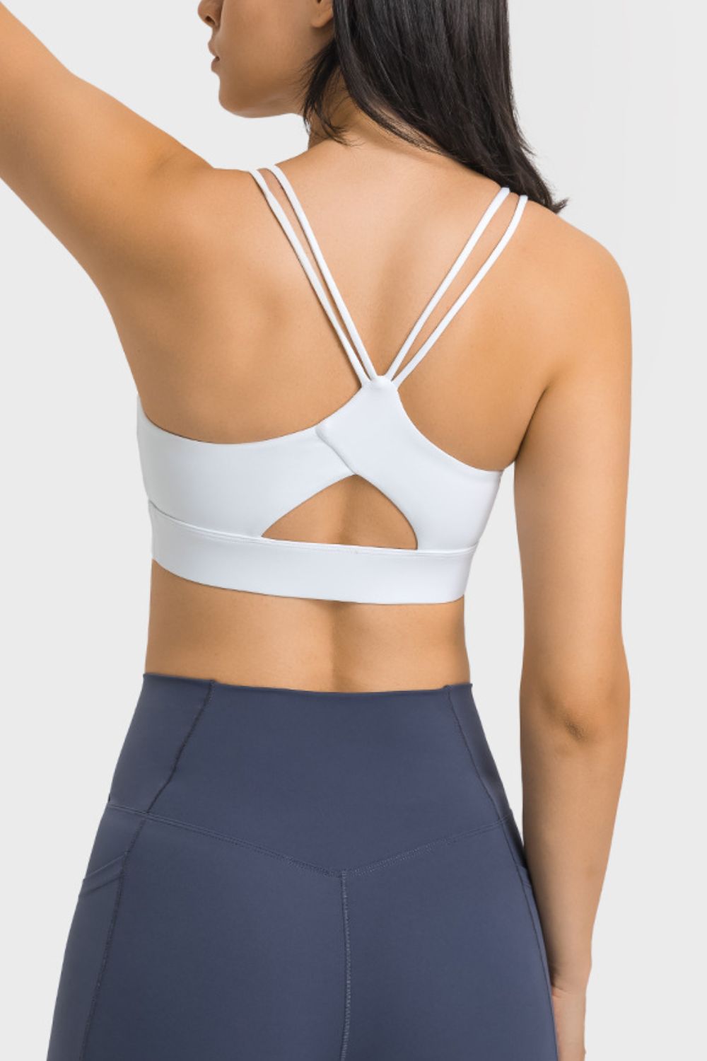 Double-Strap Cutout Sports Bra in solid color, showcasing its scoop neck design and removable padding.