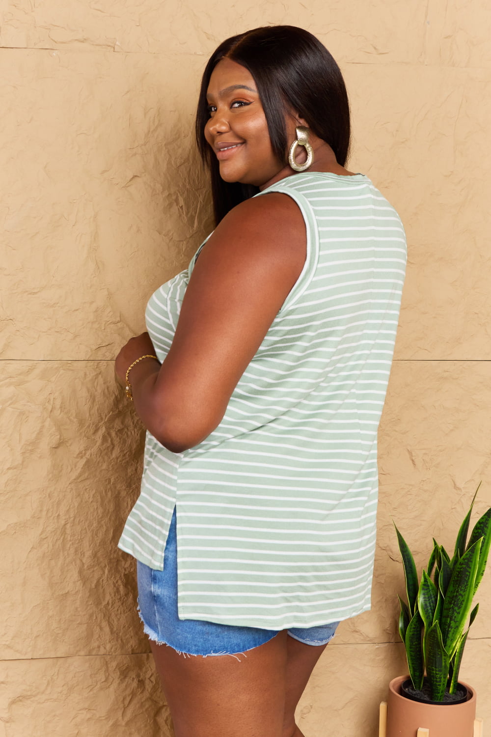 Doublju Full Size Striped Sleeveless V-Neck Top in a casual style, featuring a flattering V-neckline and a relaxed fit, perfect for layering.