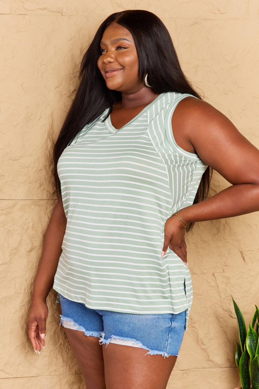 Doublju Full Size Striped Sleeveless V-Neck Top in a casual style, featuring a flattering V-neckline and a relaxed fit, perfect for layering.