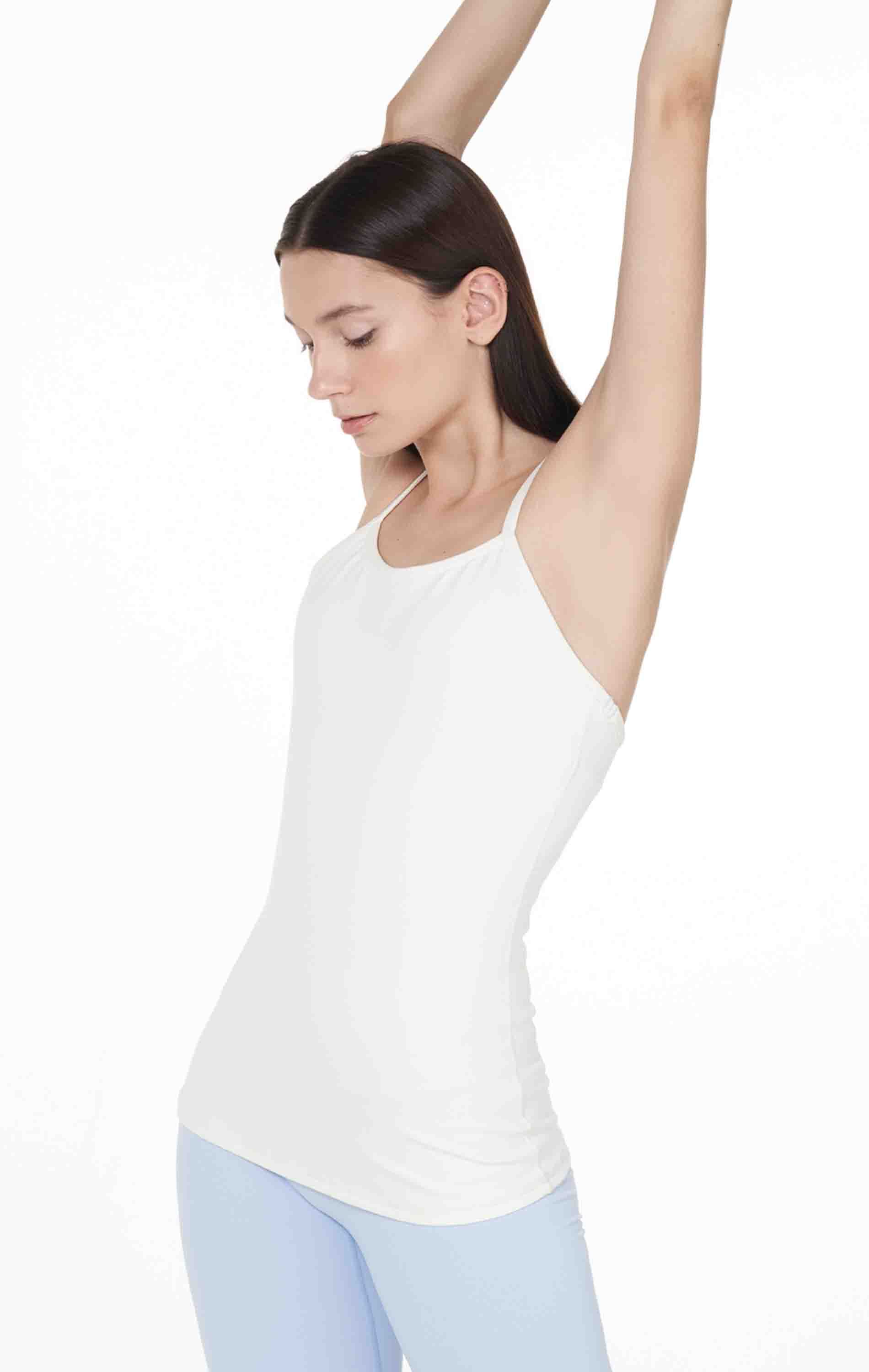 Dove Bra Tank featuring thin racerback straps and built-in bra pads, made from soft Cloudlux fabric, ideal for yoga and athleisure.